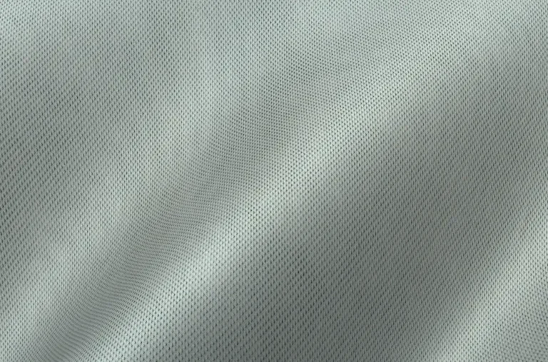 Tejido fabricado con fibras sintéticas